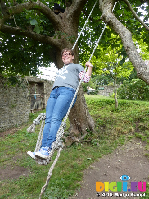 FZ018808 Jenni on rope swing in Usk Castle